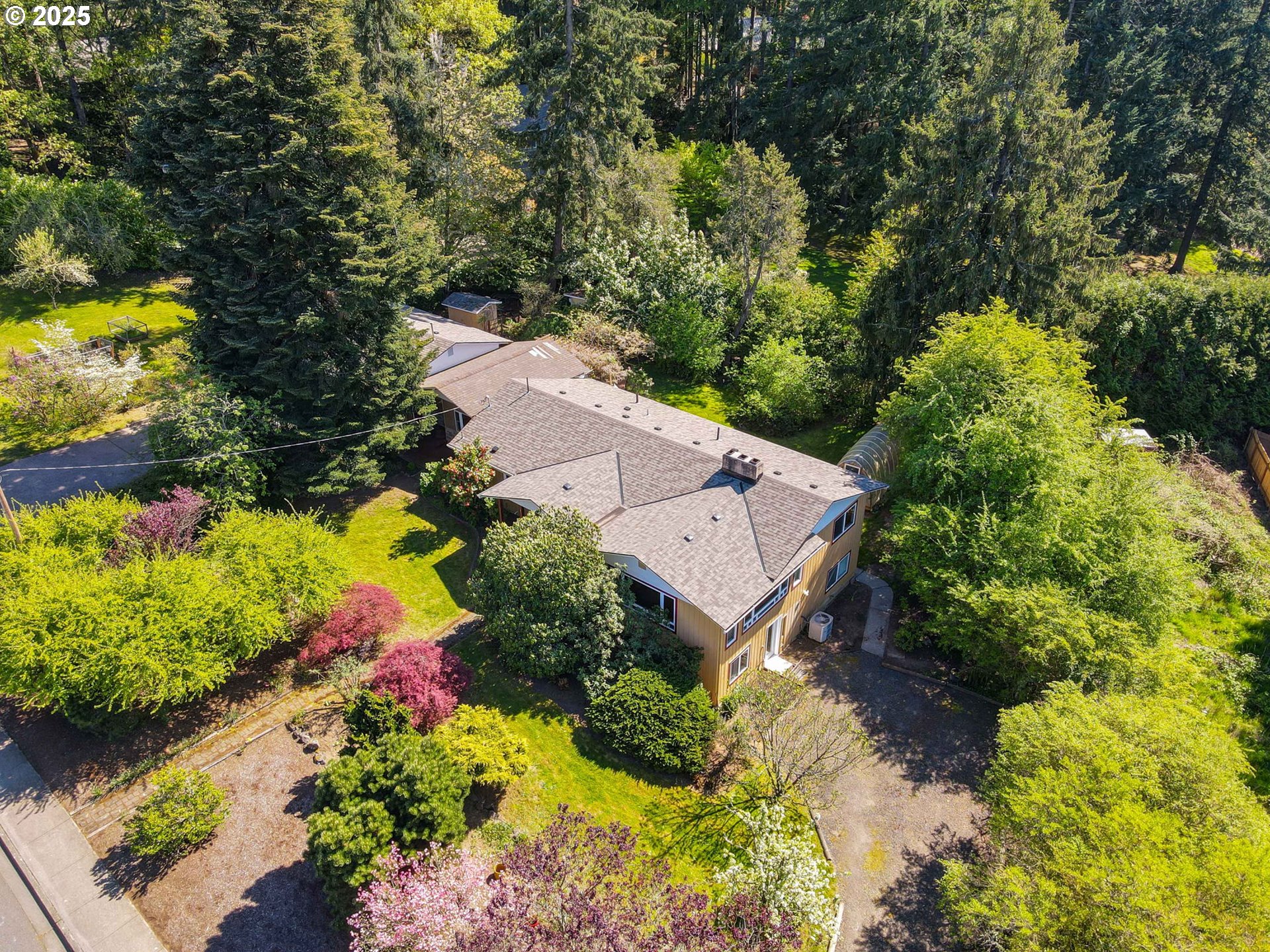 15960 Southwest Roshak Road Portland, OR 97224 - Photo 41 of 48 an aerial view of a house with a yard and garden