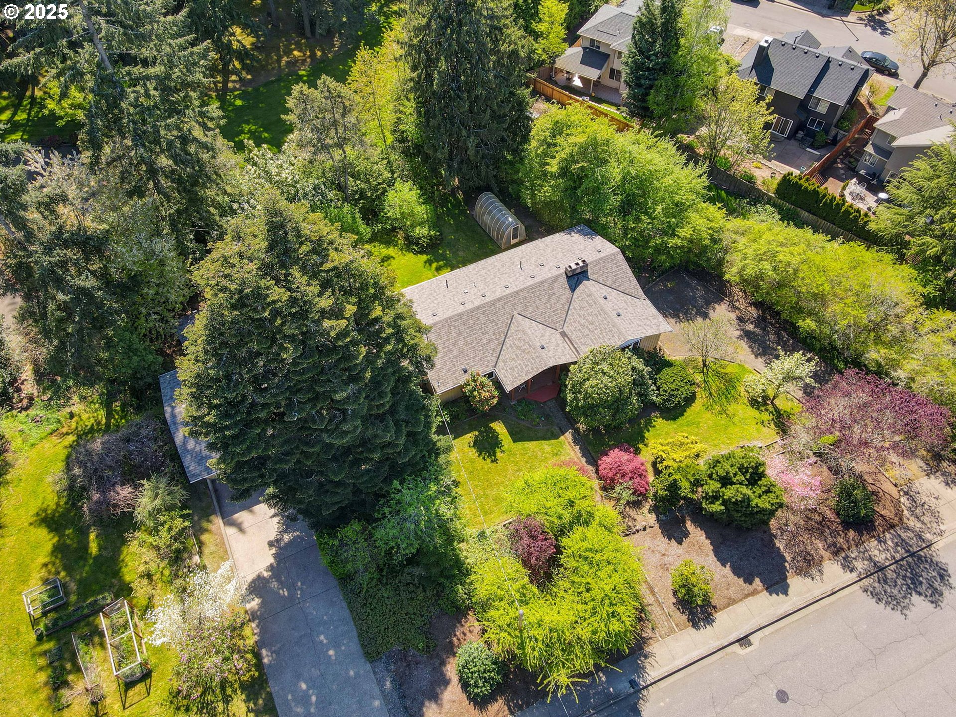 15960 Southwest Roshak Road Portland, OR 97224 - Photo 47 of 48 an aerial view of a house with a yard and swimming pool