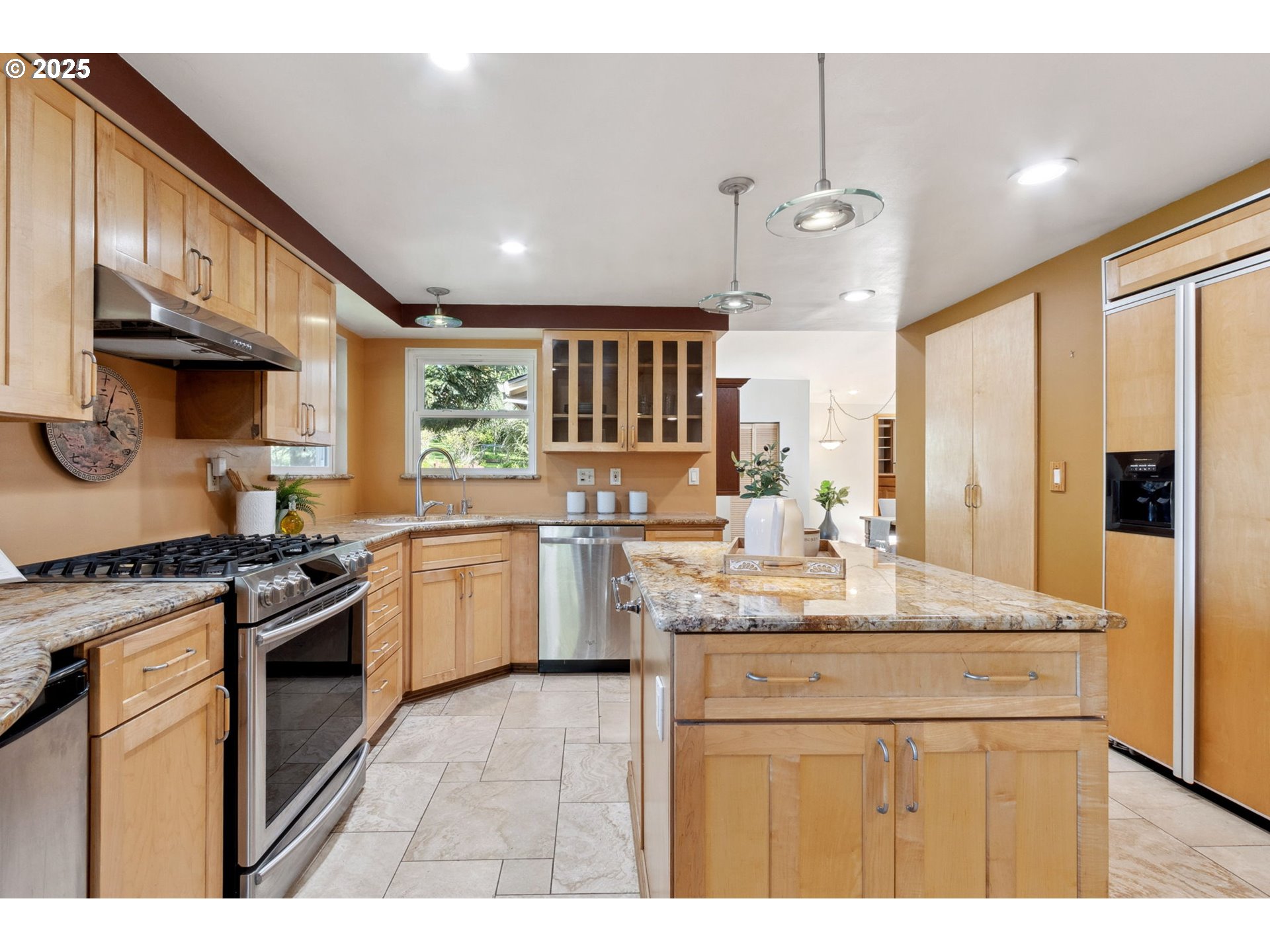 15960 Southwest Roshak Road Portland, OR 97224 - Photo 7 of 48 a kitchen with a sink stove and refrigerator