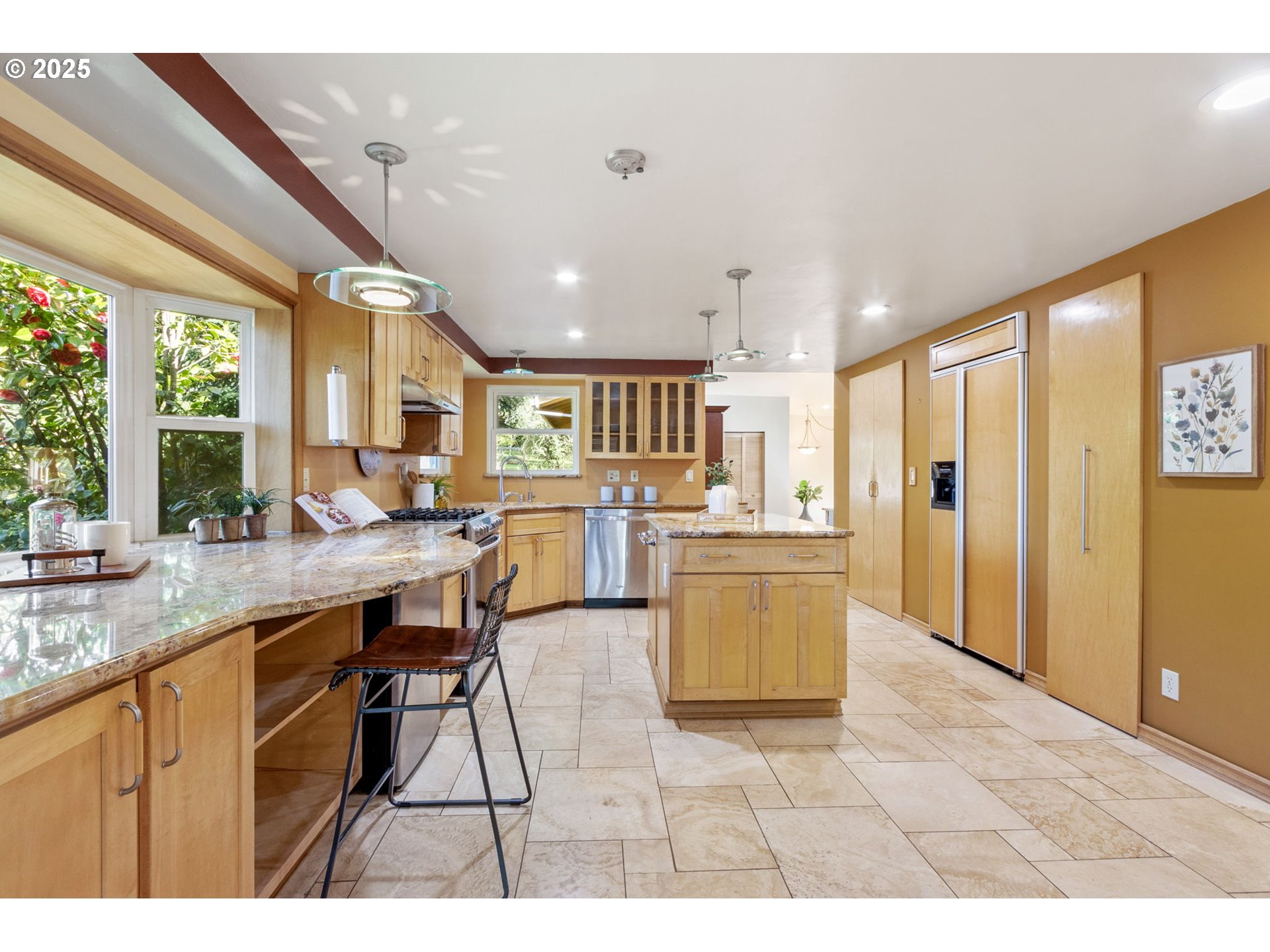 15960 Southwest Roshak Road Portland, OR 97224 - Photo 8 of 48 a open kitchen with a sink cabinets and window