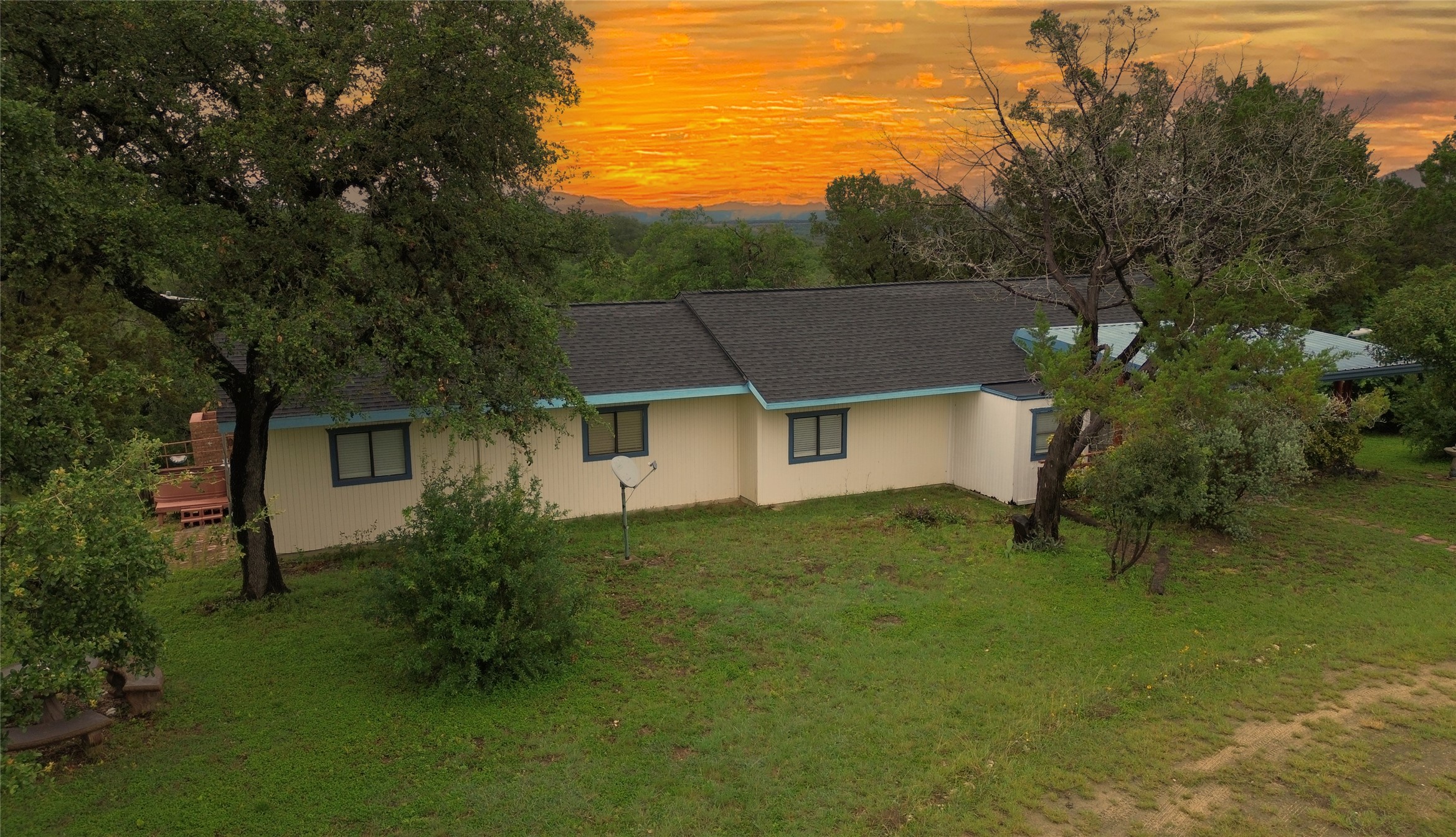 27600 Ranch To Market 1431 Marble Falls, TX 78654 - Photo 2 of 33 An aerial view over the house toward back yard views