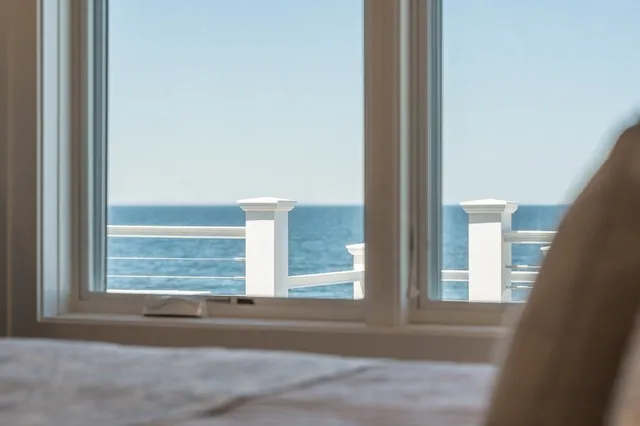 a view of entry way with wooden floor