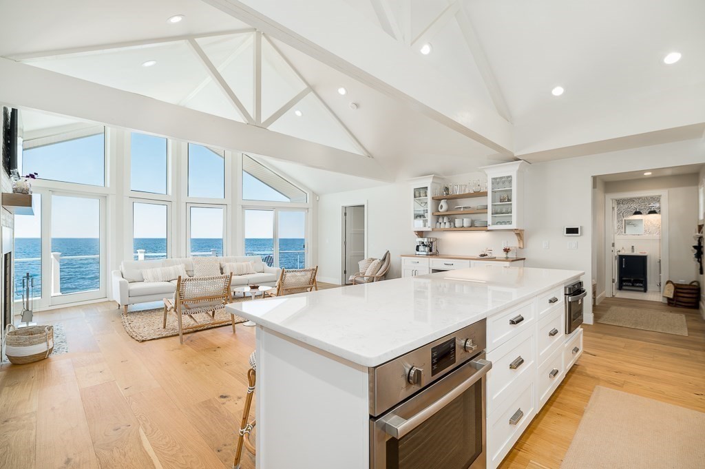 14 Sunset Point Road Gloucester, MA 01930 - Photo 2 of 40 a large white kitchen with a large window