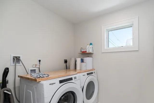 a view of livingroom with washer and dryer