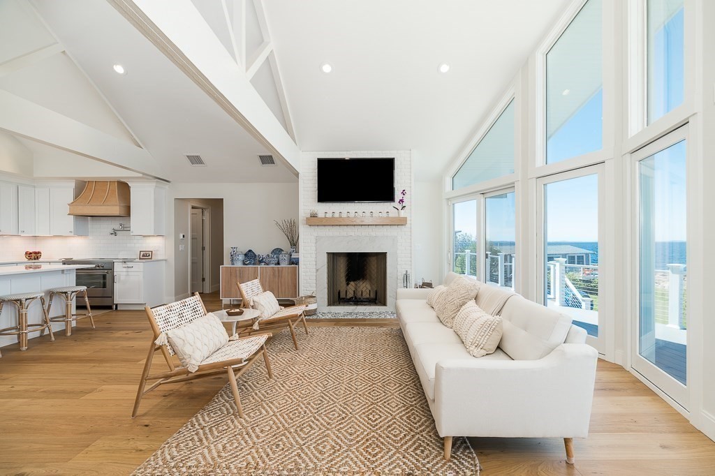 14 Sunset Point Road Gloucester, MA 01930 - Photo 8 of 40 a living room with furniture fireplace and flat screen tv
