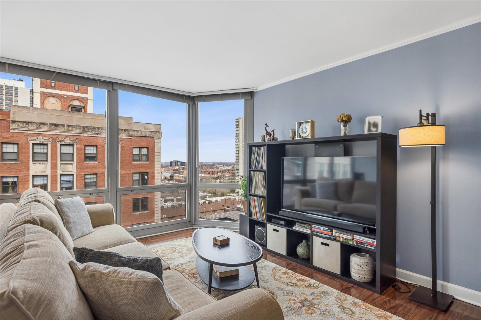 21 West Goethe Street, Unit 15A Chicago, IL 60610 - Photo 6 of 20 a living room with furniture and a flat screen tv