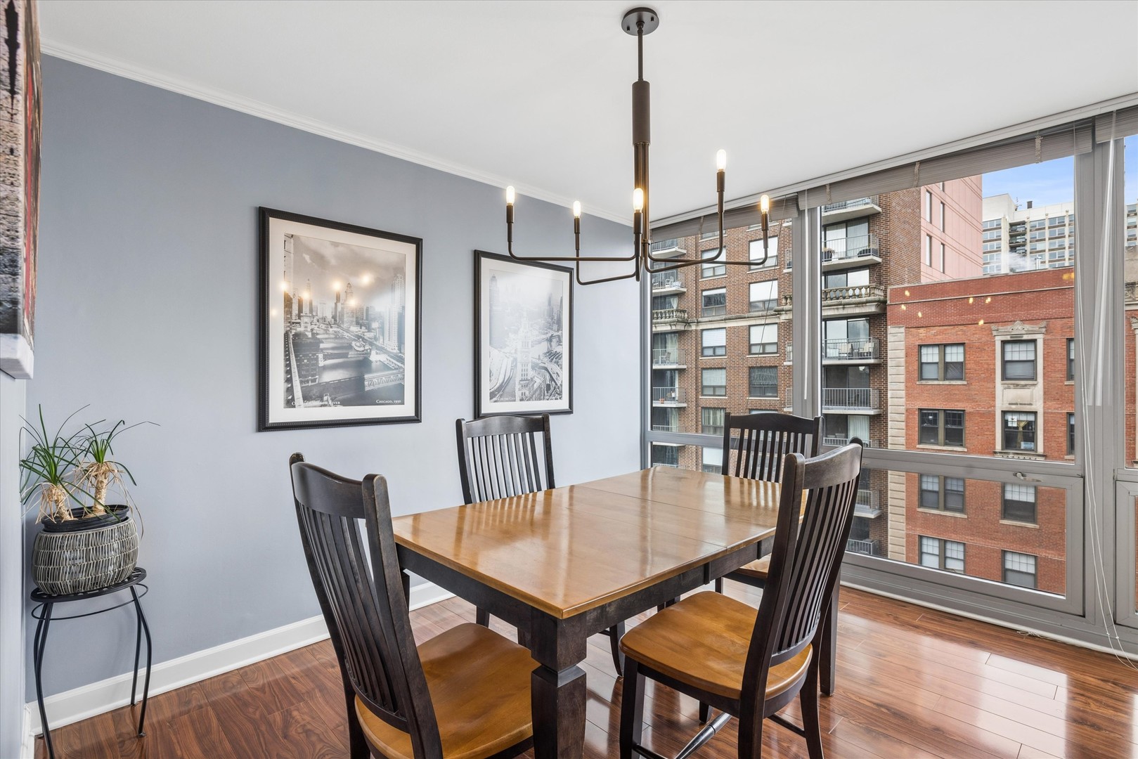 21 West Goethe Street, Unit 15A Chicago, IL 60610 - Photo 9 of 20 a view of a dining room with furniture window and wooden floor