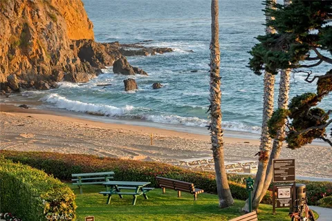 a view of a swimming pool with an ocean view