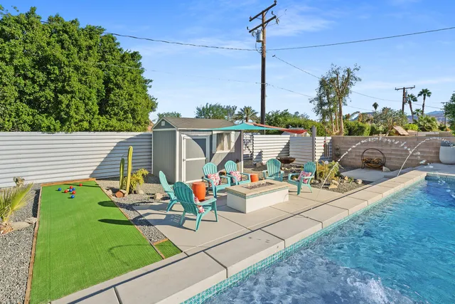 a view of a terrace with sitting area
