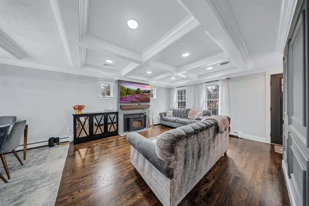 3 Stoddard Street Upton, MA 01568 - Photo 12 of 42 a living room with furniture and a wooden floor