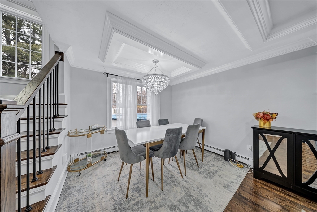 3 Stoddard Street Upton, MA 01568 - Photo 15 of 42 a view of a dining room with furniture window and wooden floor