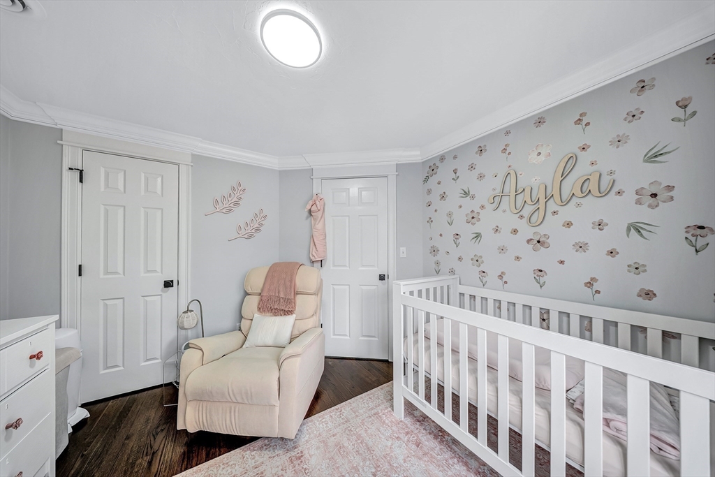 3 Stoddard Street Upton, MA 01568 - Photo 23 of 42 a bedroom with furniture and wooden floor