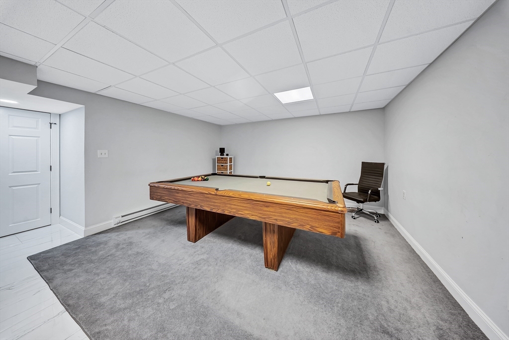 3 Stoddard Street Upton, MA 01568 - Photo 26 of 42 a room with wooden floor pool table and windows