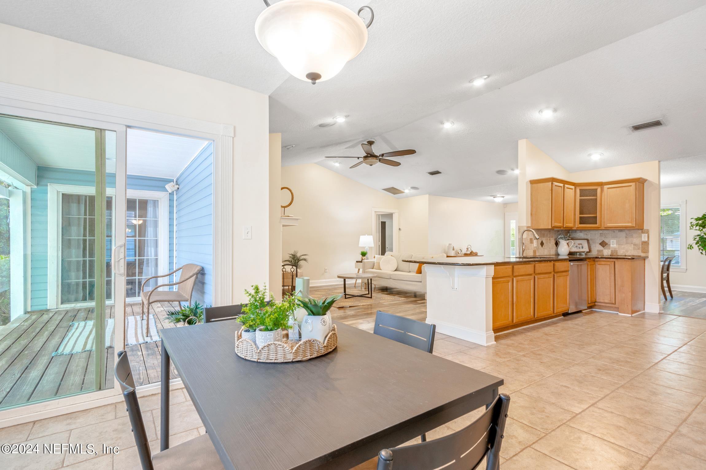205 Shirley's Way St. Augustine, FL 32086 - Photo 13 of 57 a large kitchen with kitchen island a large counter top and stainless steel appliances