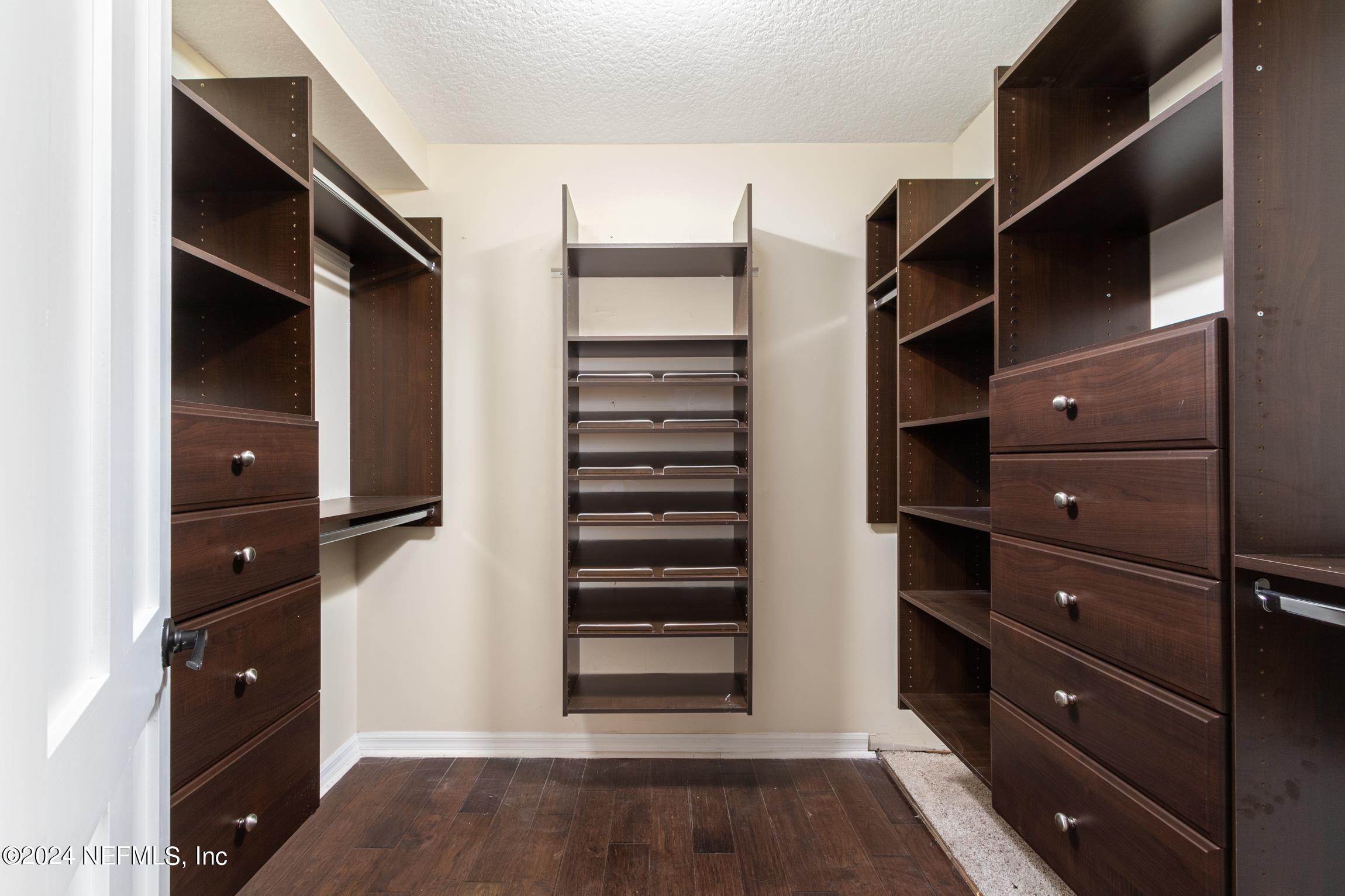 205 Shirley's Way St. Augustine, FL 32086 - Photo 21 of 57 a view of walk in closet and bedroom