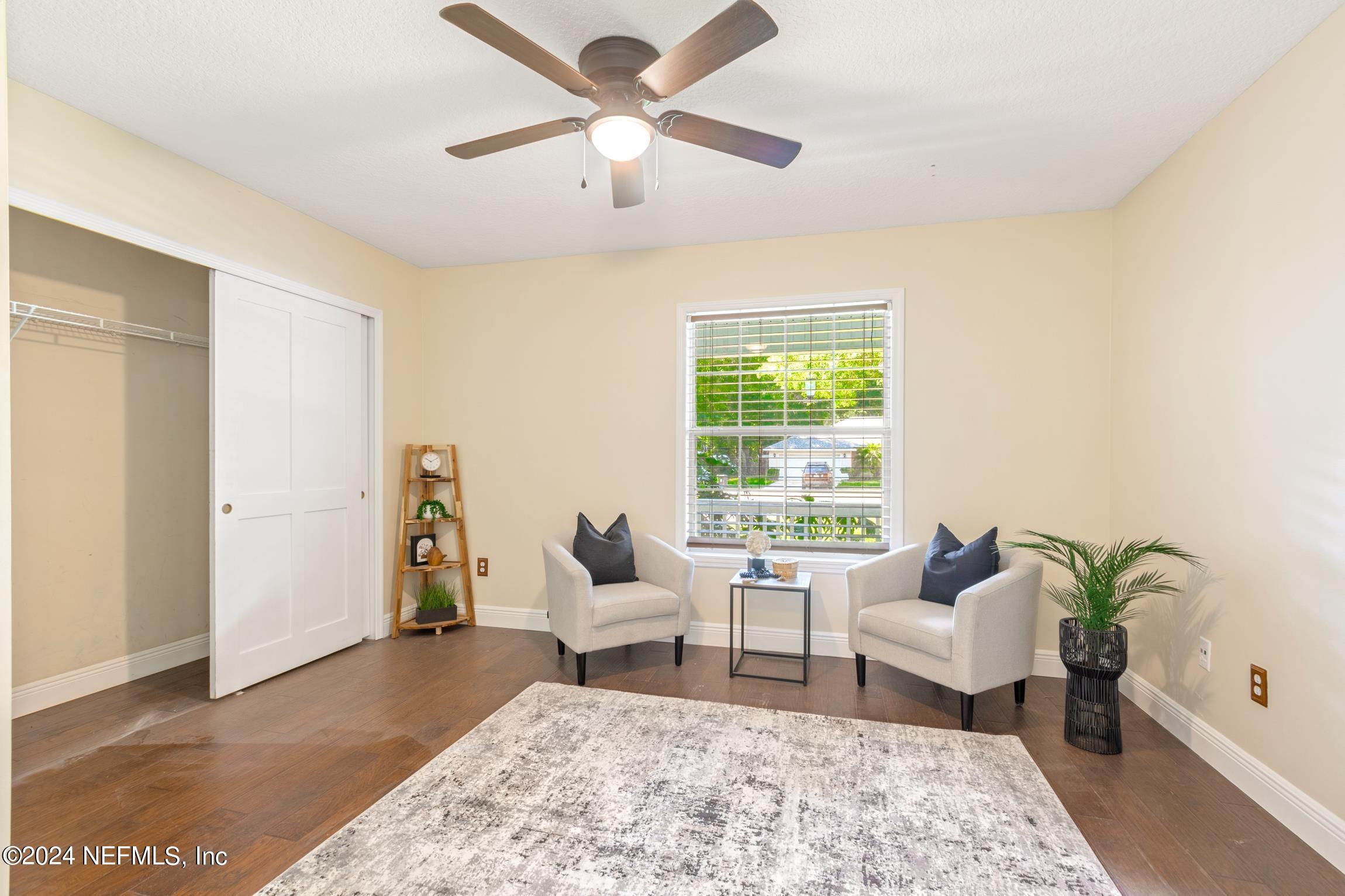 205 Shirley's Way St. Augustine, FL 32086 - Photo 22 of 57 a living room with furniture and a large window
