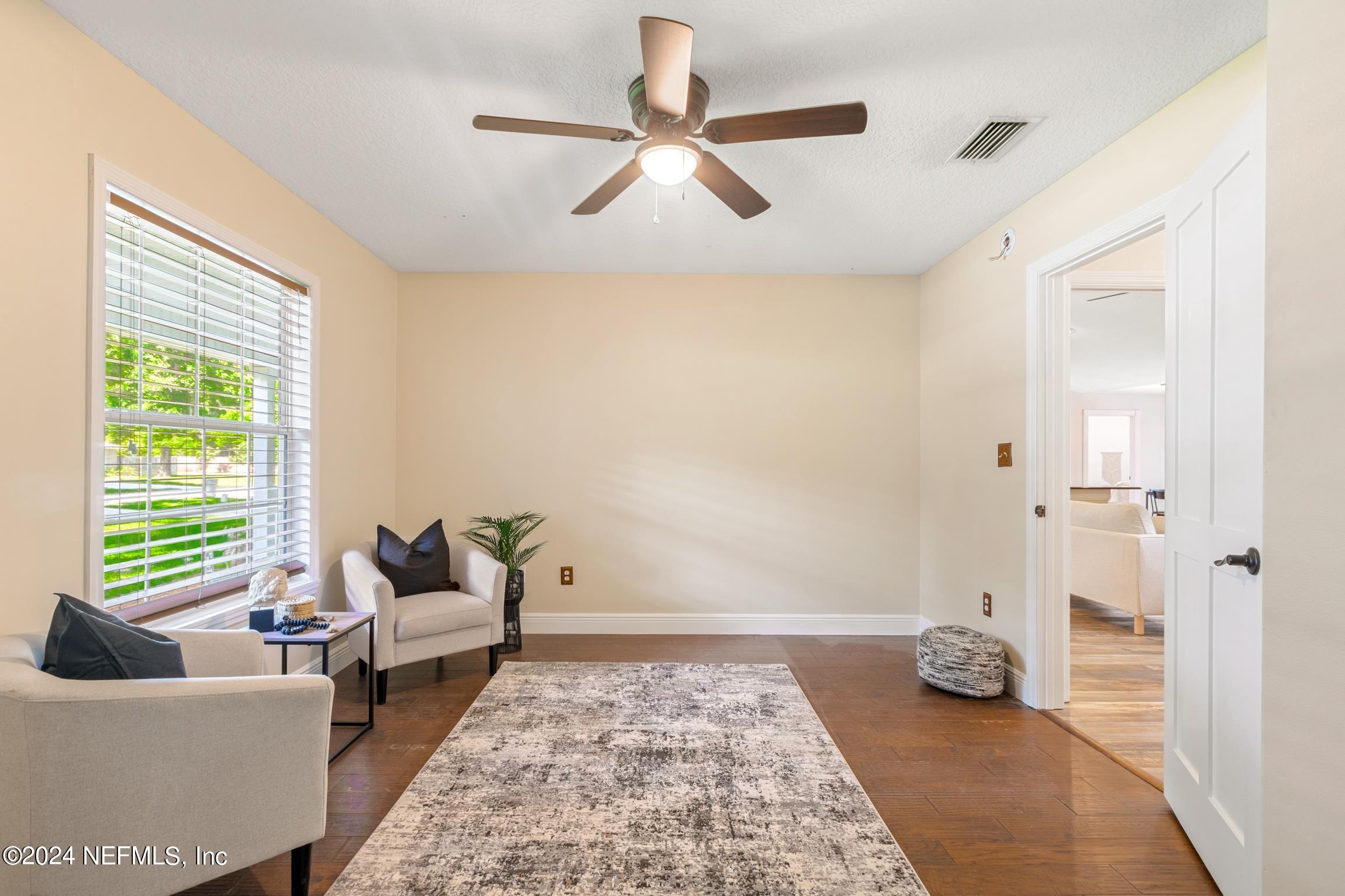205 Shirley's Way St. Augustine, FL 32086 - Photo 23 of 57 a living room with furniture and a window