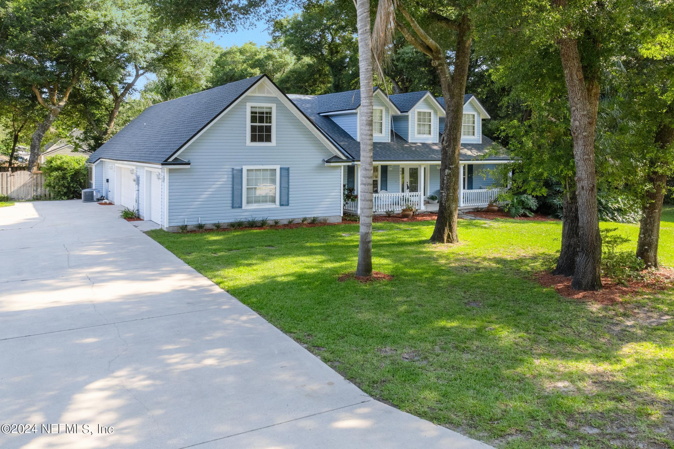 205 Shirley's Way St. Augustine, FL 32086 - Photo 47 of 57 a front view of a house with a yard