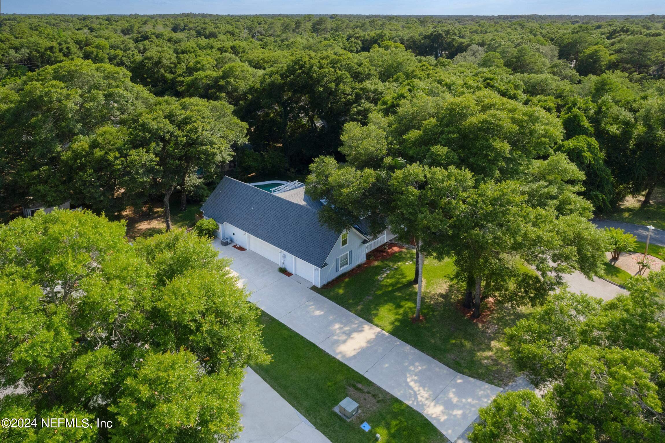 205 Shirley's Way St. Augustine, FL 32086 - Photo 48 of 57 an aerial view of a house with a yard