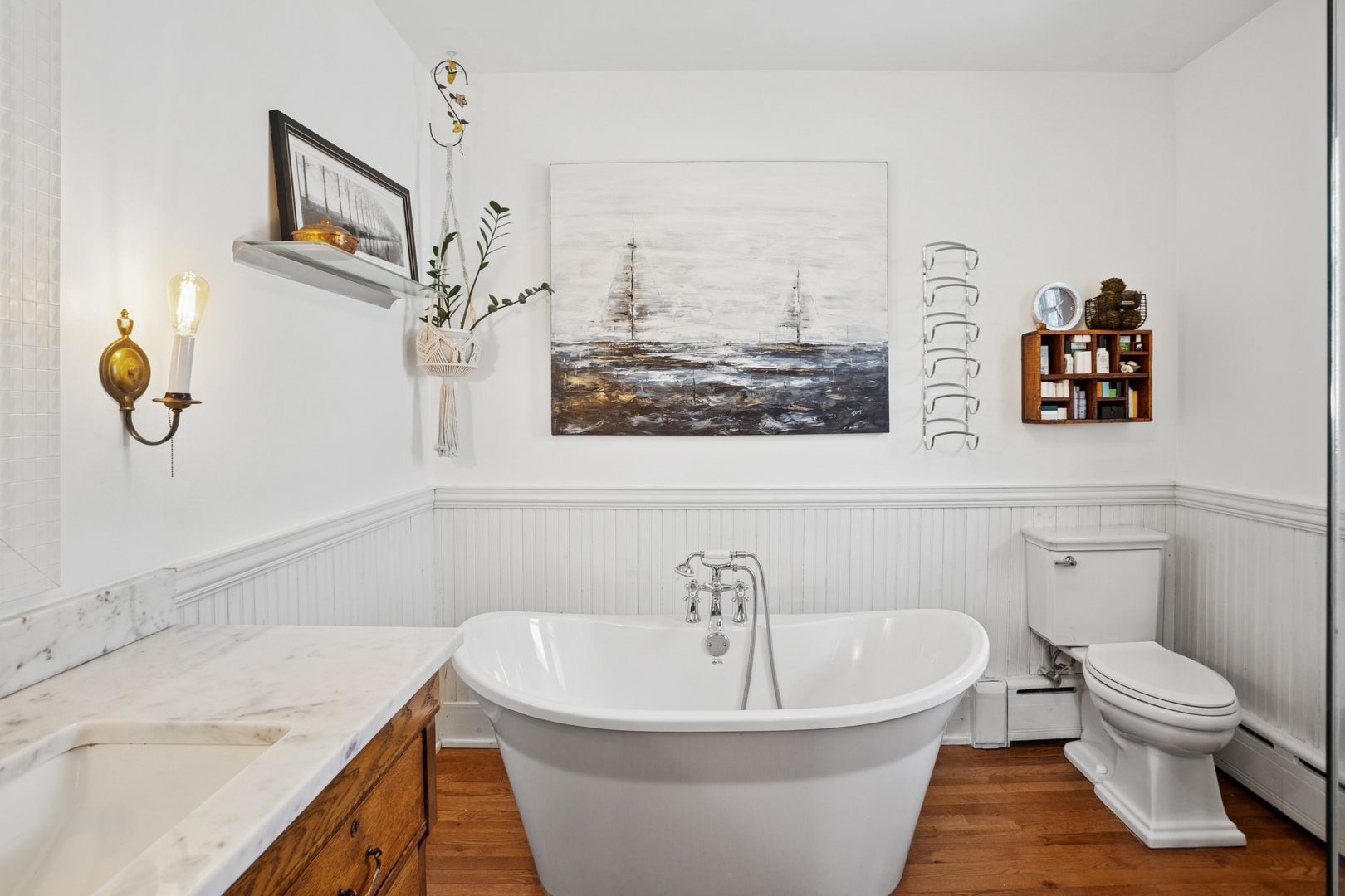 305 North Addison Avenue Elmhurst, IL 60126 - Photo 14 of 29 a bathroom with a sink and mirror with toilet