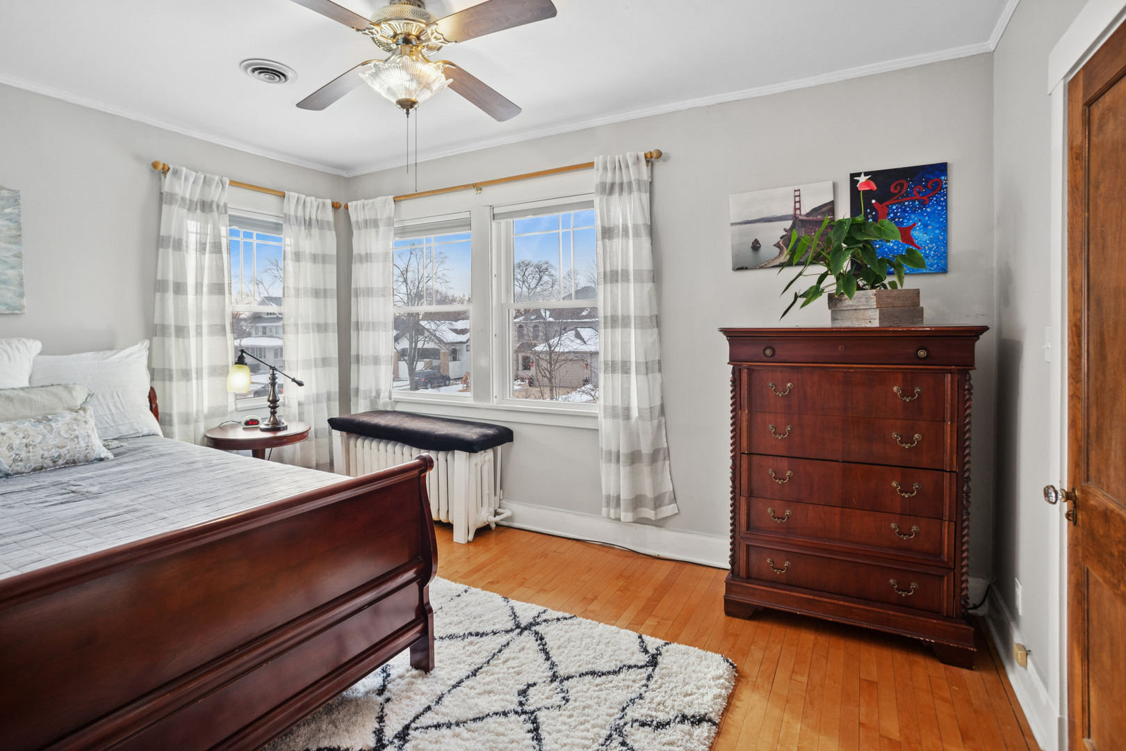 305 North Addison Avenue Elmhurst, IL 60126 - Photo 17 of 29 a living room with furniture and a dresser
