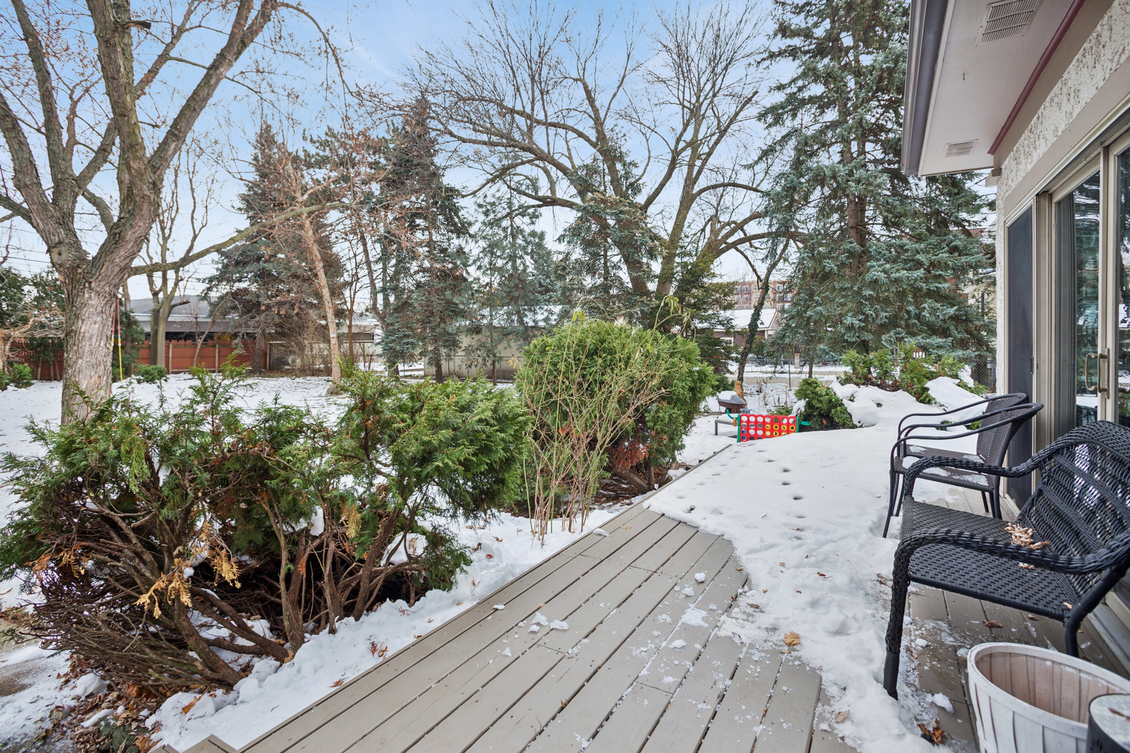 305 North Addison Avenue Elmhurst, IL 60126 - Photo 22 of 29 a wooden bench sitting in middle of a yard