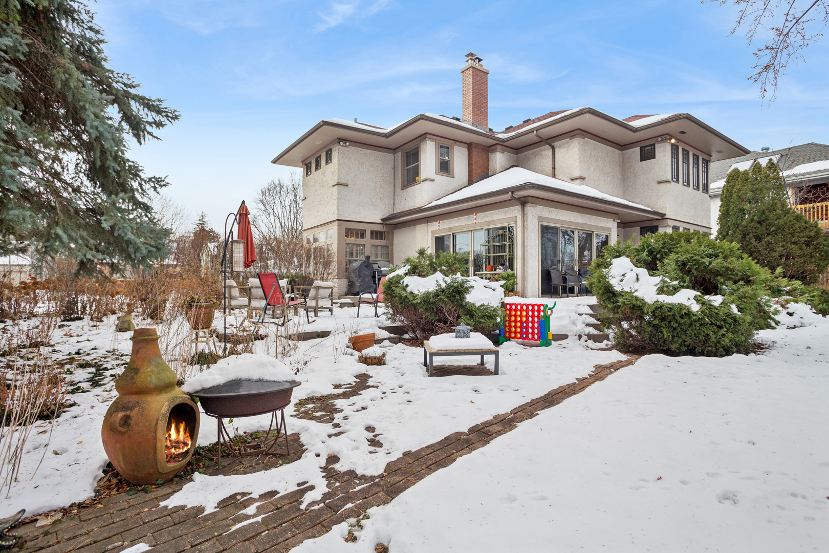 305 North Addison Avenue Elmhurst, IL 60126 - Photo 24 of 29 a view of the front of house with fire pit