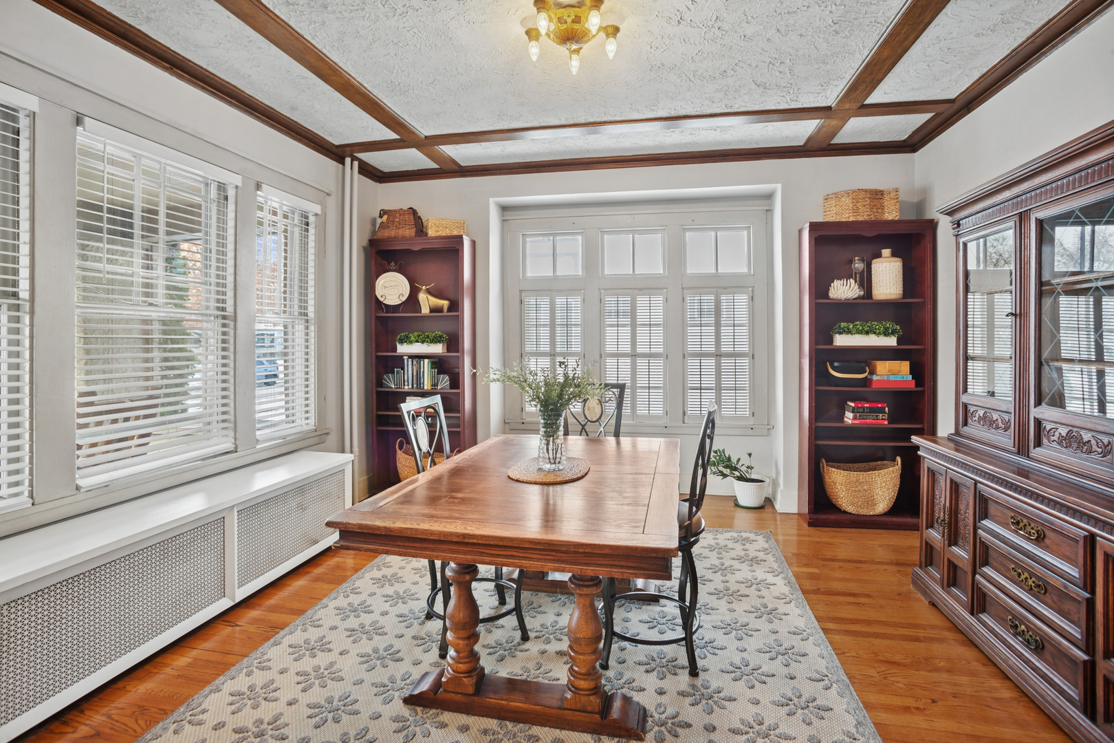 305 North Addison Avenue Elmhurst, IL 60126 - Photo 7 of 29 a dining room with furniture and wooden floor