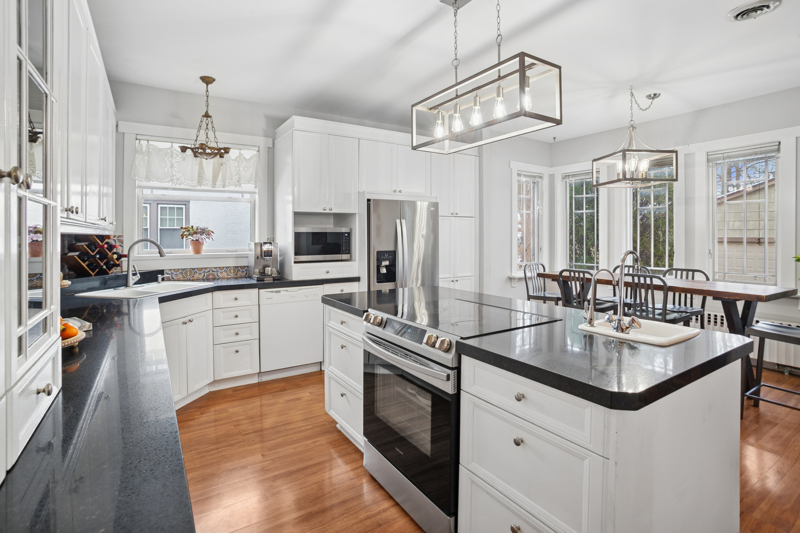 305 North Addison Avenue Elmhurst, IL 60126 - Photo 8 of 29 a kitchen with stainless steel appliances granite countertop a sink stove and refrigerator