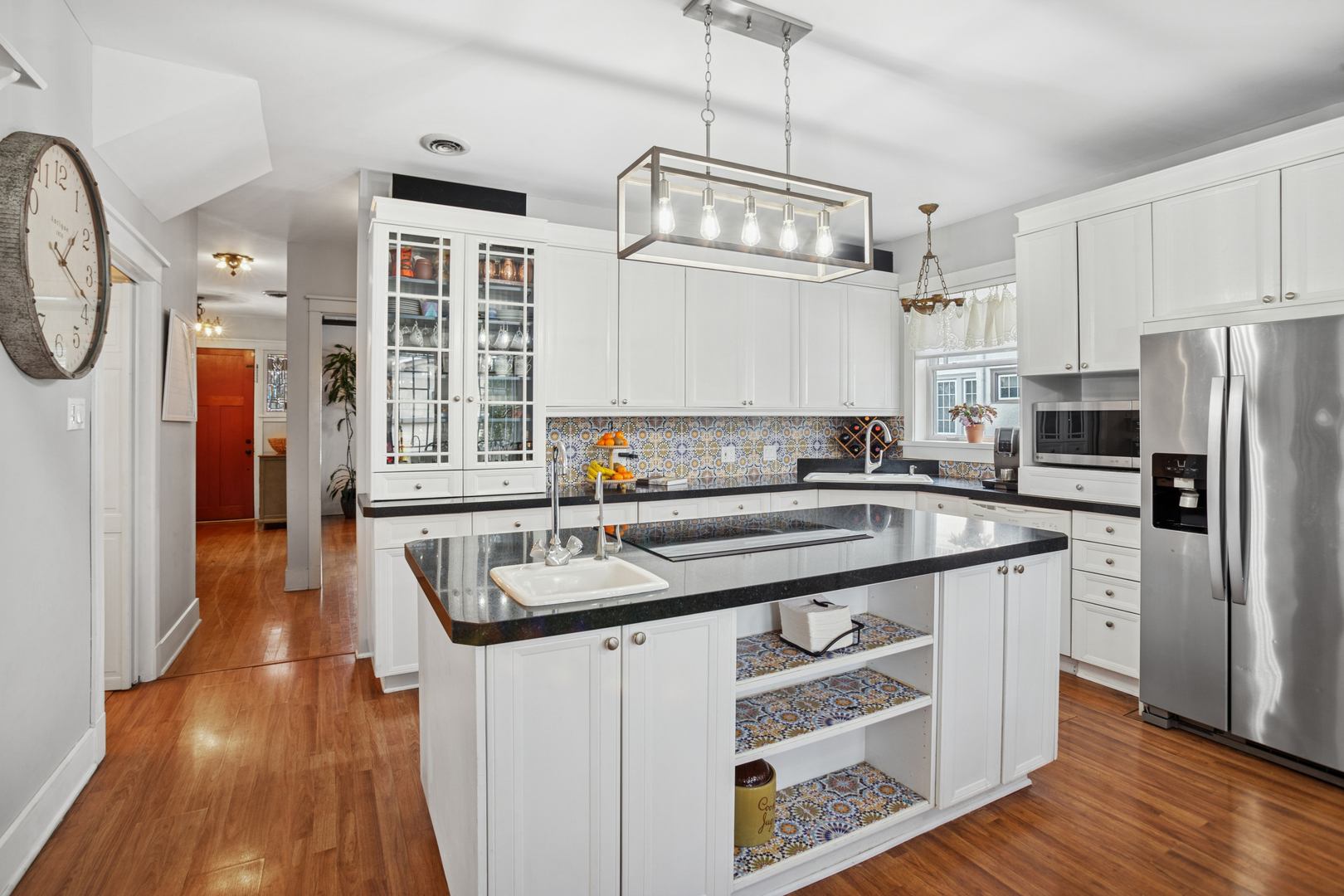 305 North Addison Avenue Elmhurst, IL 60126 - Photo 9 of 29 a kitchen with stainless steel appliances granite countertop a sink stove and refrigerator