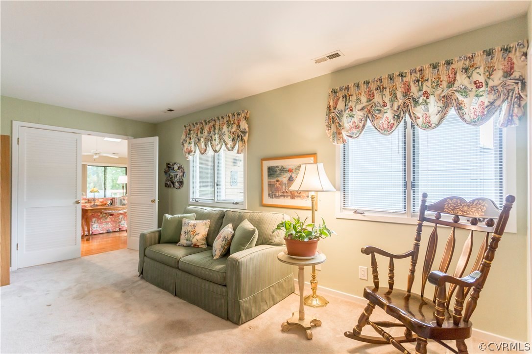 14338 Regatta Pointe Road Midlothian, VA 23112 - Photo 20 of 40 a living room with furniture and wooden floor