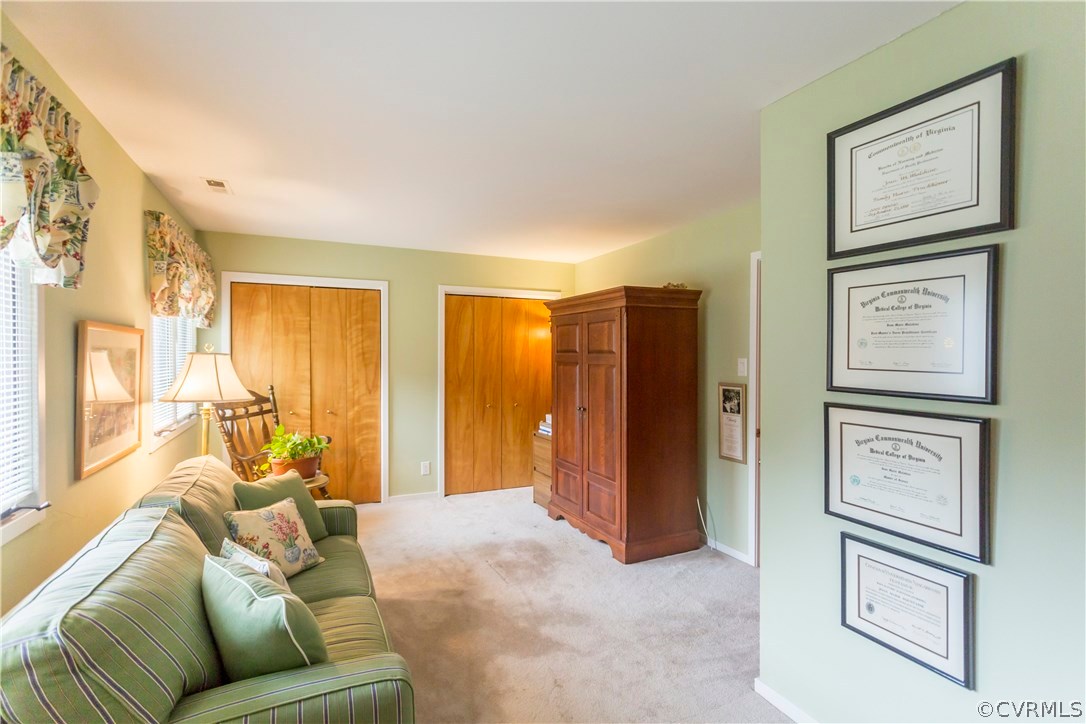14338 Regatta Pointe Road Midlothian, VA 23112 - Photo 21 of 40 a living room with furniture and a window