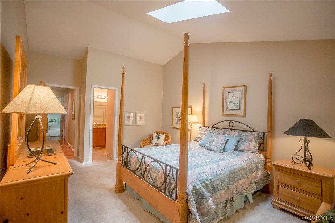 14338 Regatta Pointe Road Midlothian, VA 23112 - Photo 31 of 40 a bedroom with a bed and a lamp