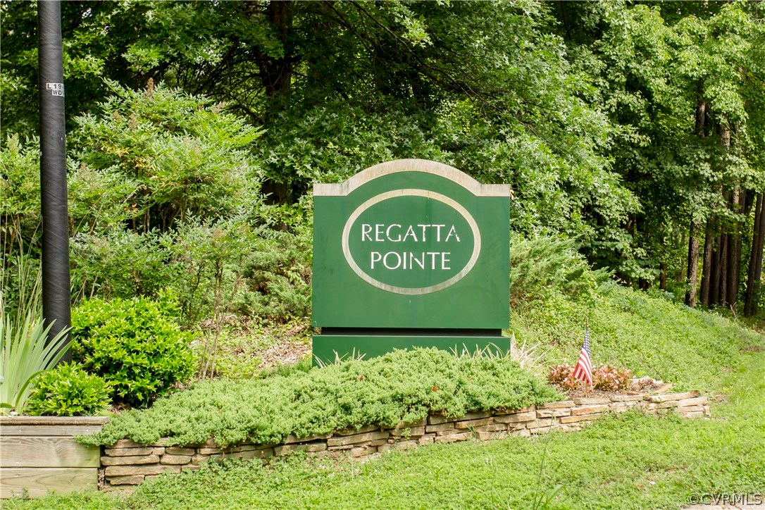 14338 Regatta Pointe Road Midlothian, VA 23112 - Photo 40 of 40 a sign on the side of the tree