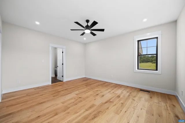 a white bath tub sitting in a bathroom
