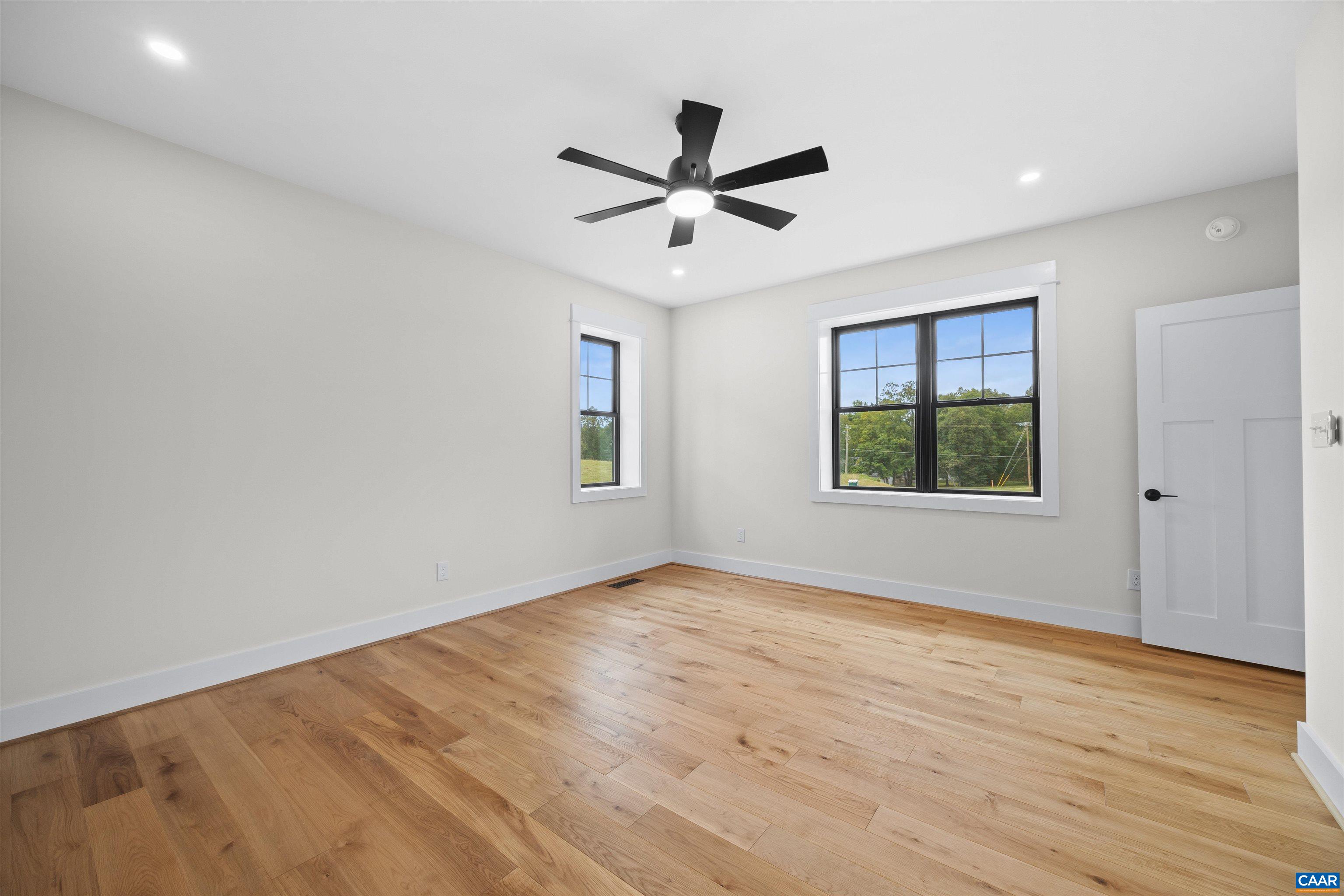 1416 Ladd Road Waynesboro, VA 22980 - Photo 26 of 66 wooden floor in an empty room with a window