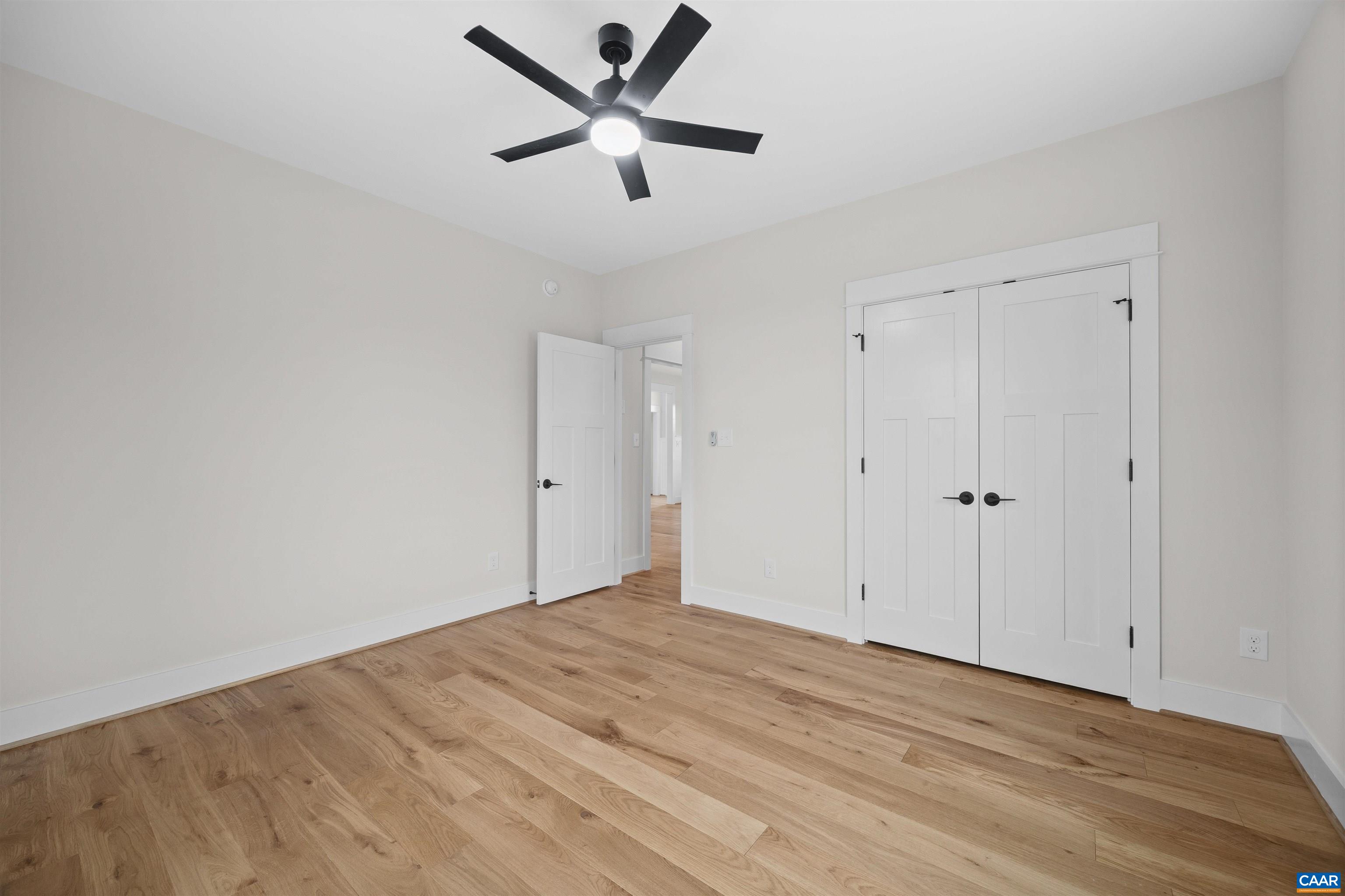 1416 Ladd Road Waynesboro, VA 22980 - Photo 32 of 66 a view of a room with wooden floor and a ceiling fan