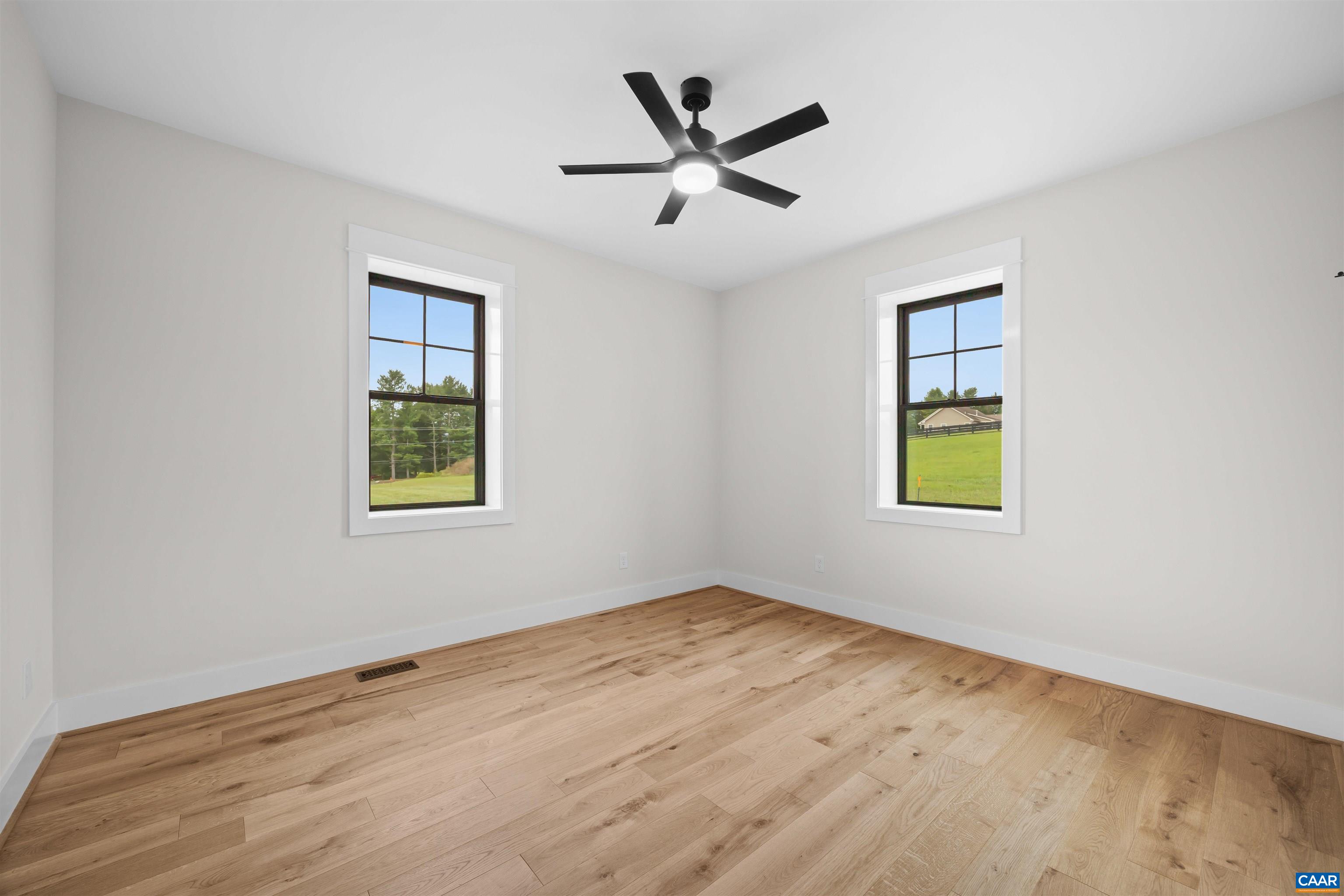 1416 Ladd Road Waynesboro, VA 22980 - Photo 34 of 66 wooden floor in an empty room with a window