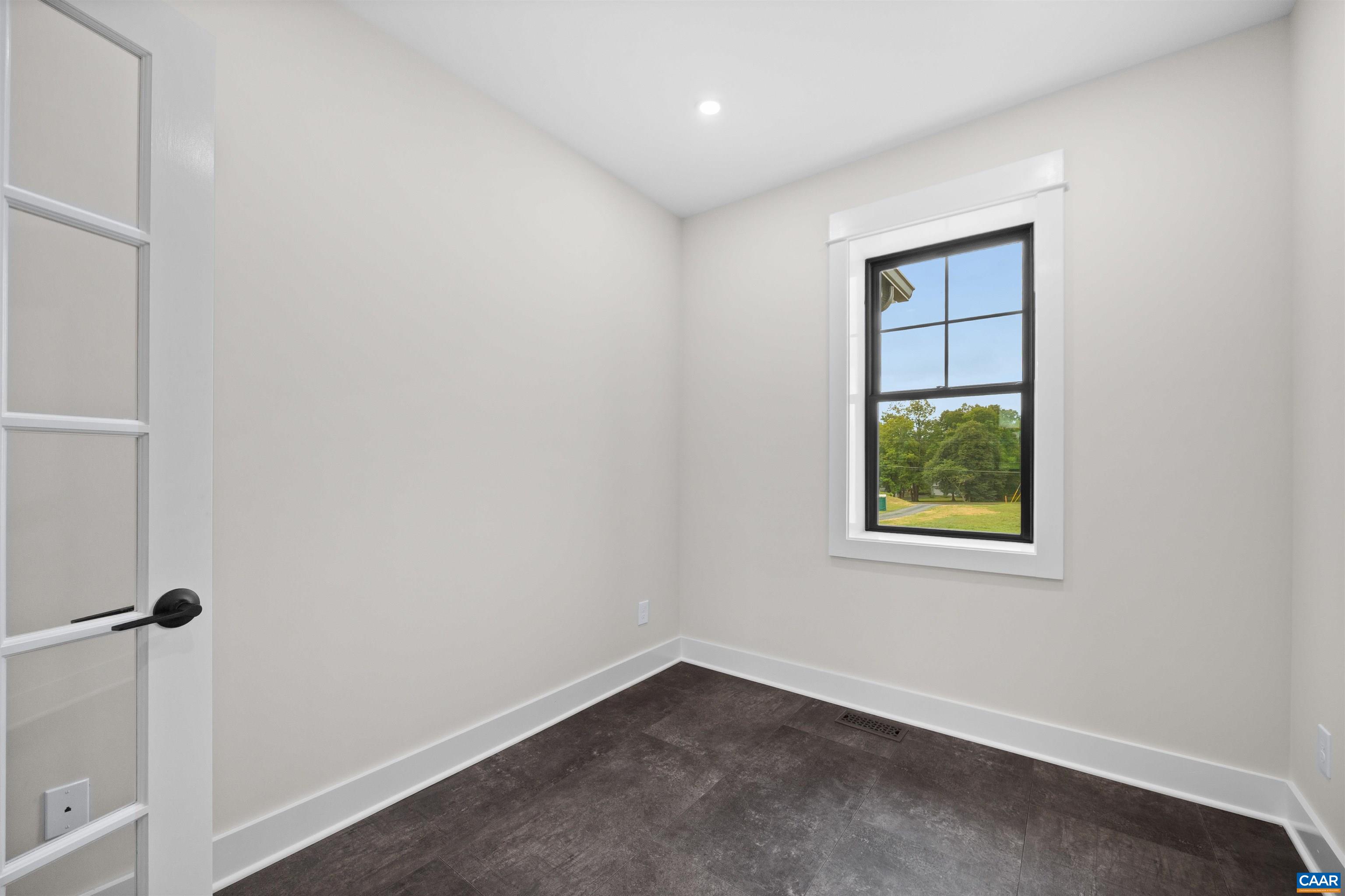 1416 Ladd Road Waynesboro, VA 22980 - Photo 39 of 66 an empty room with windows