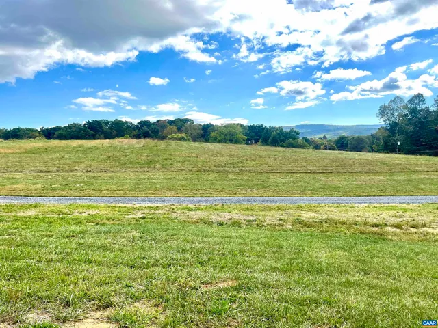a view of an ocean and a mountain