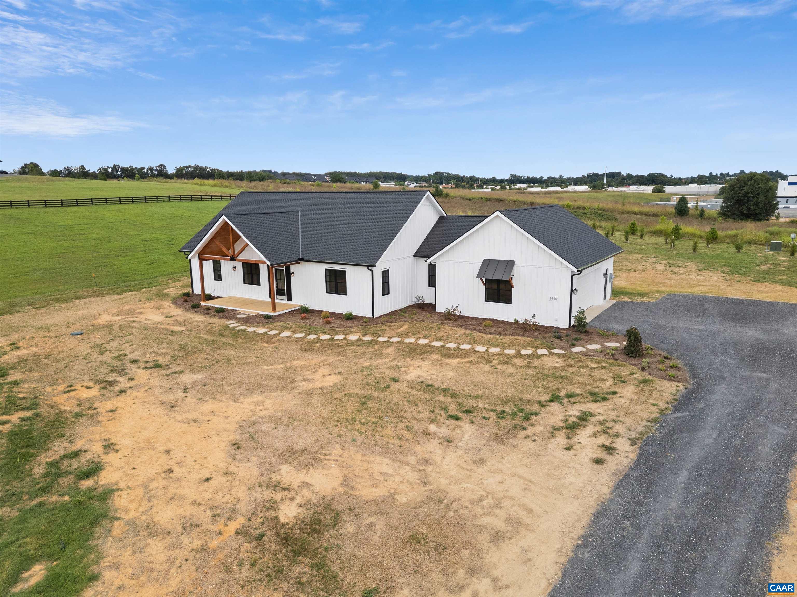 1416 Ladd Road Waynesboro, VA 22980 - Photo 45 of 66 a view of a lake with a house in the background