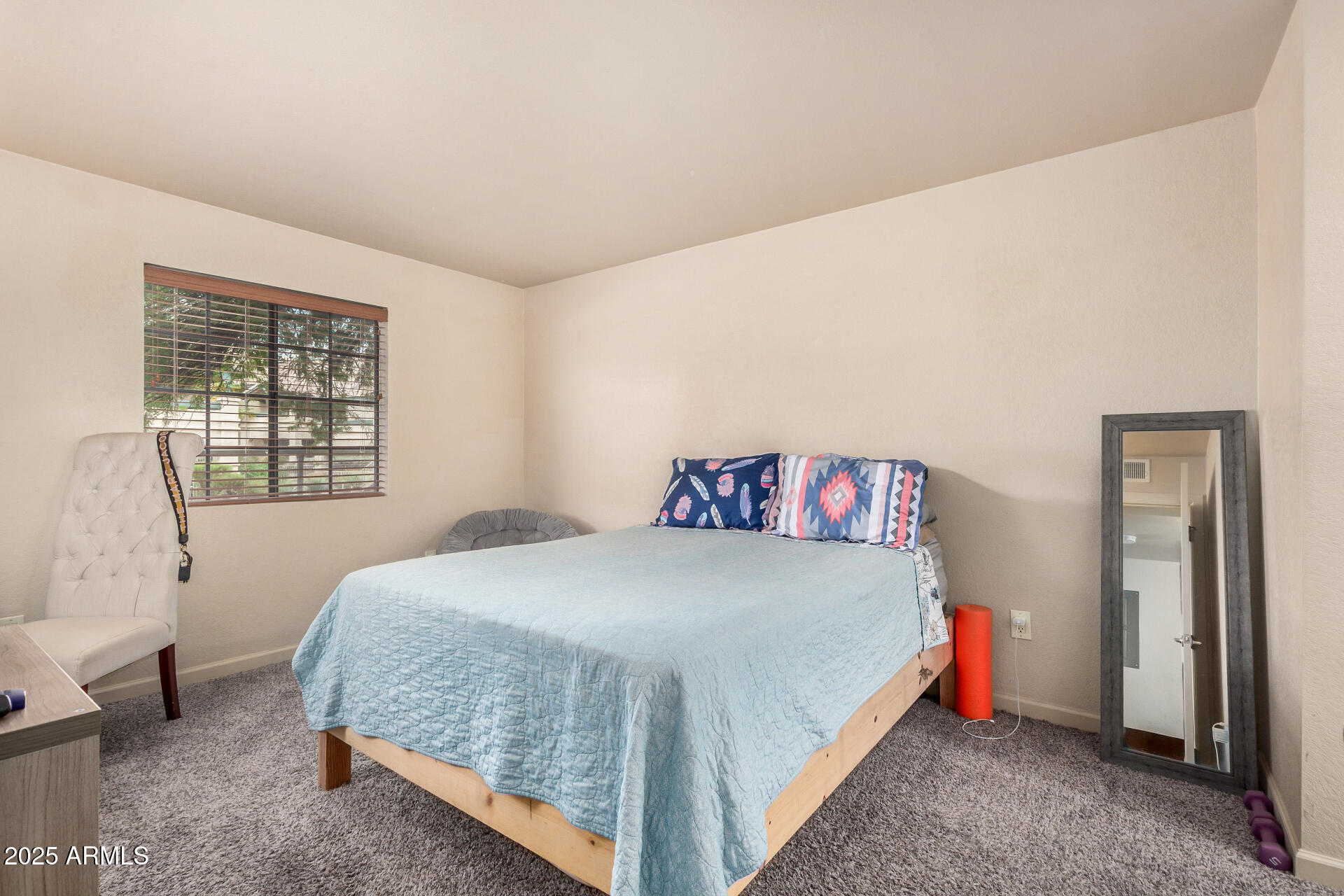 101 South Players Club Drive, Unit 22201 Tucson, AZ 85745 - Photo 16 of 31 a bedroom with a bed and a window