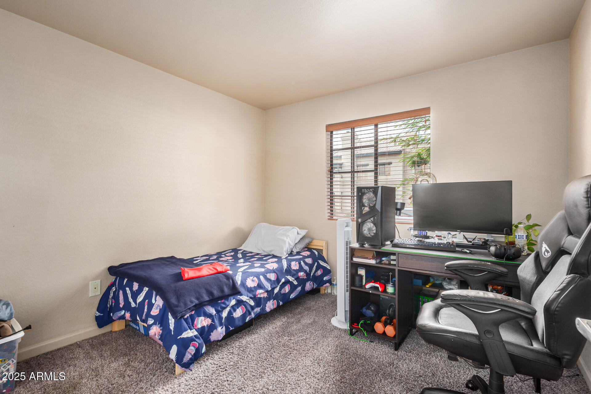 101 South Players Club Drive, Unit 22201 Tucson, AZ 85745 - Photo 19 of 31 a bedroom with a bed and furniture