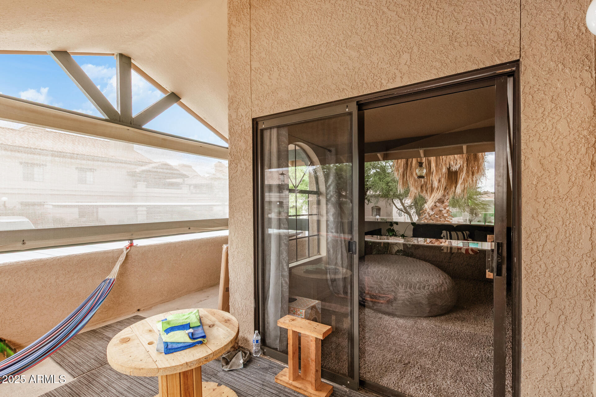 101 South Players Club Drive, Unit 22201 Tucson, AZ 85745 - Photo 22 of 31 a living room with a couch and a table