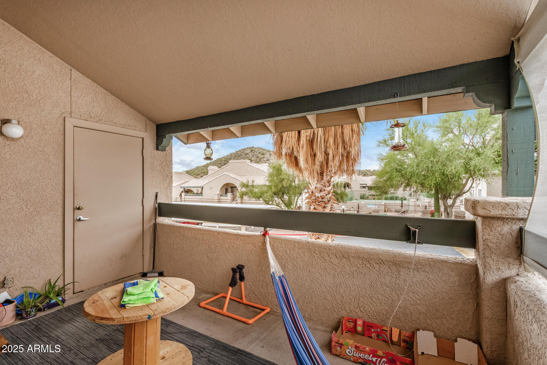 101 South Players Club Drive, Unit 22201 Tucson, AZ 85745 - Photo 23 of 31 a living room with furniture and a large window