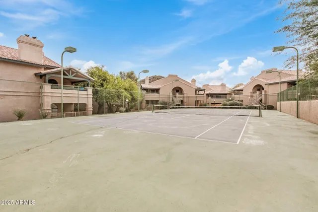 a view of a building with a yard