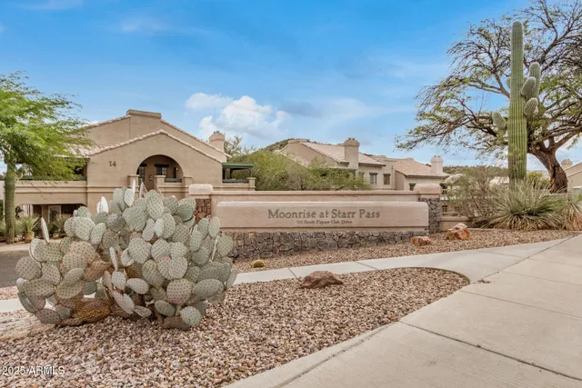 a house view with a outdoor space