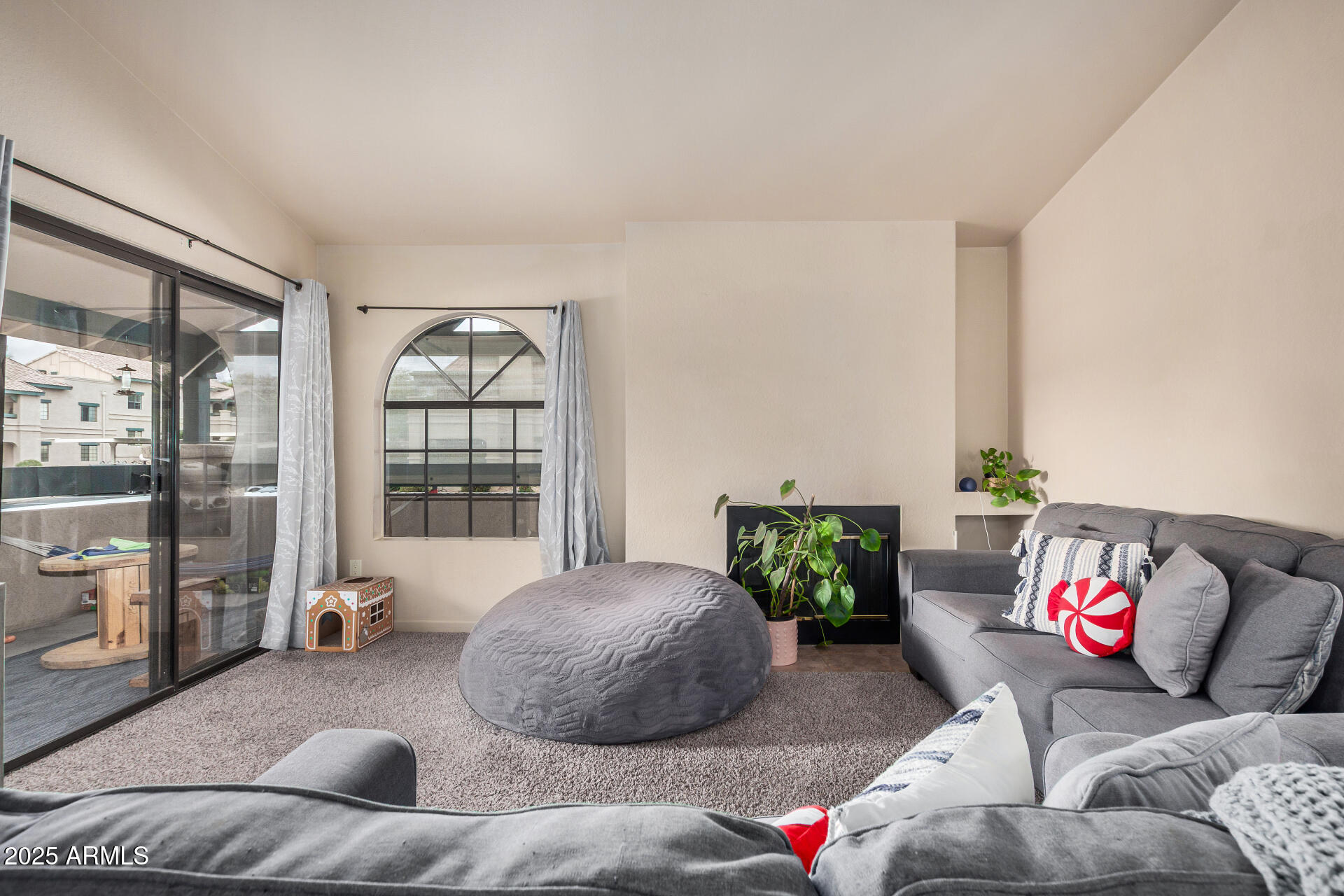 101 South Players Club Drive, Unit 22201 Tucson, AZ 85745 - Photo 6 of 31 a bedroom with furniture and a potted plant