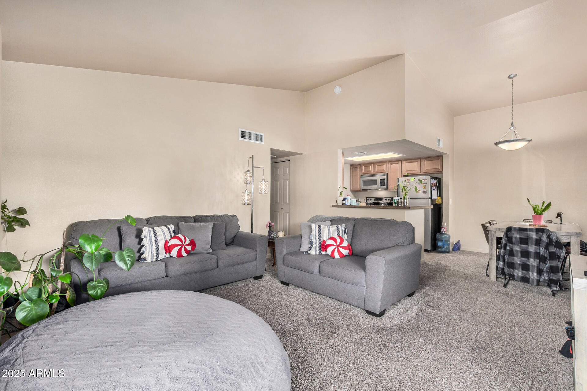 101 South Players Club Drive, Unit 22201 Tucson, AZ 85745 - Photo 8 of 31 a living room with furniture and a couch