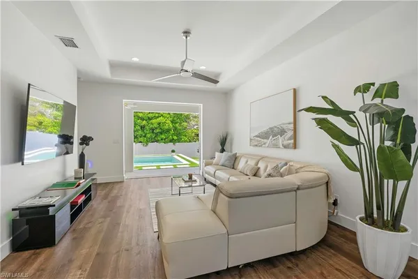 a open dining room with stainless steel appliances furniture stove and kitchen view